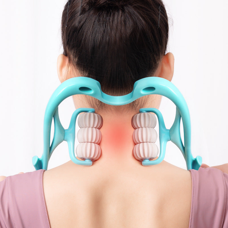 Woman using 6-wheel neck massager on upper back
