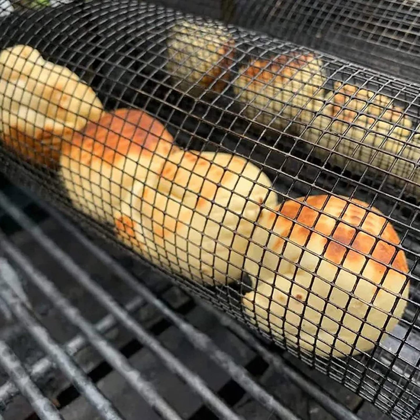 BBQ basket cooking evenly over charcoal