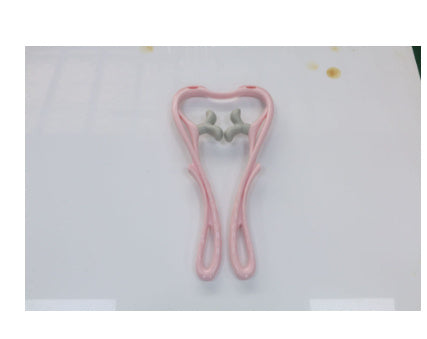 Roller tool used on tense shoulder muscles