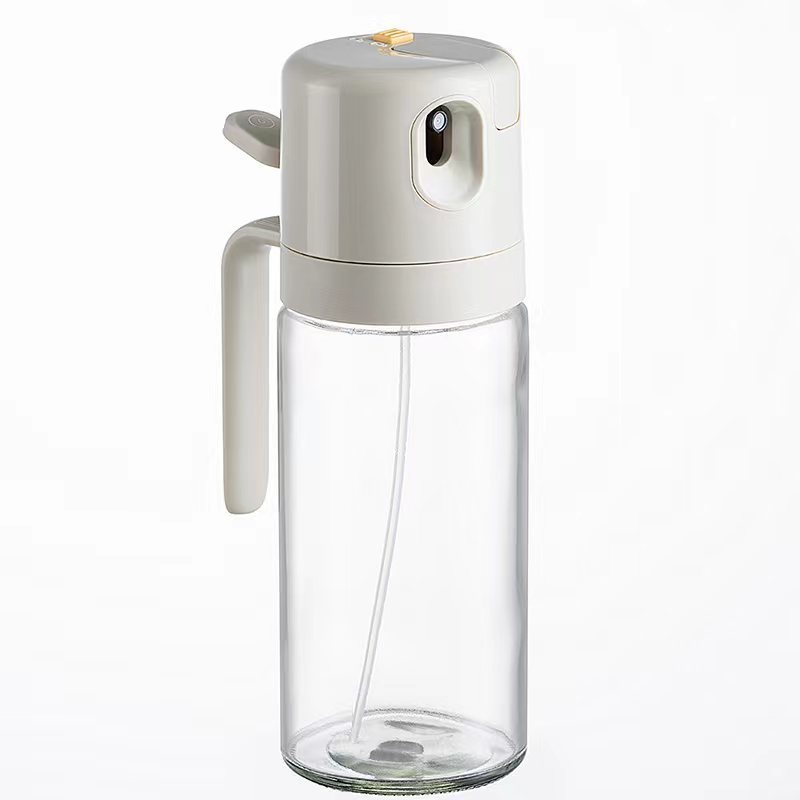Hand holding spray bottle