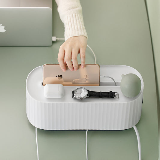 Cable organizer box on desk